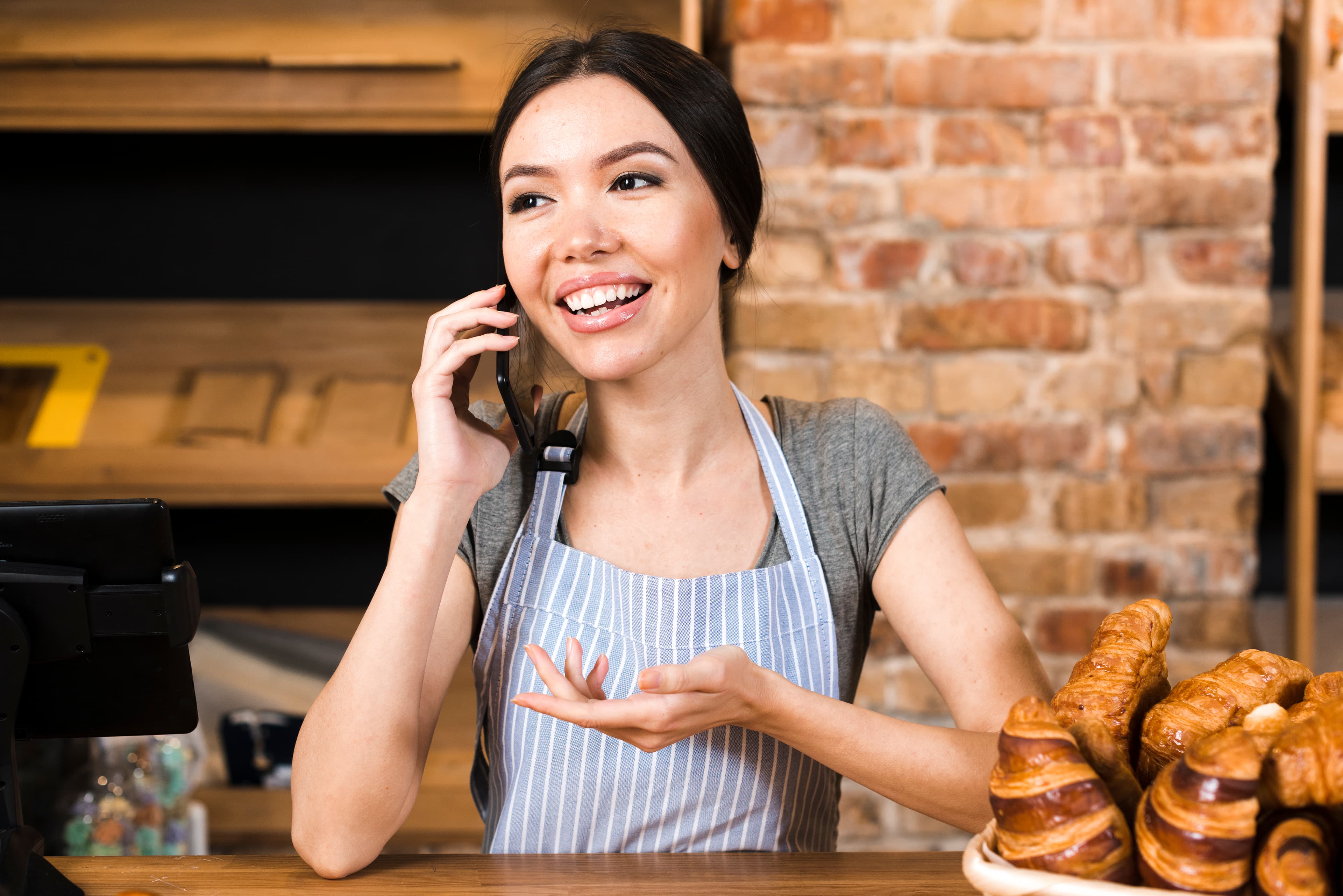 Restaurant professional taking customer call